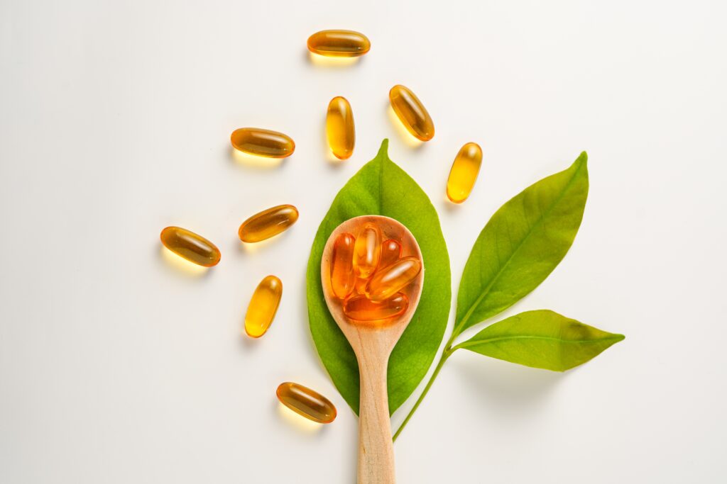 Supplement capsules on table showcasing various health products