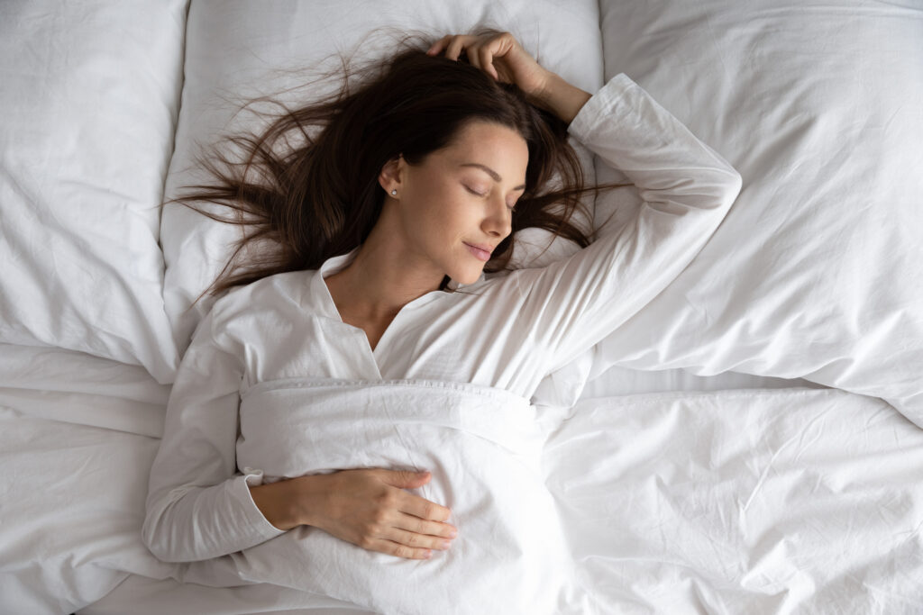 Beauty woman sleeping peacefully for health and wellness restoration