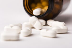 Magnesium supplement bottle on table
