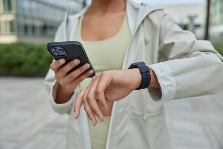 Woman wearing smartwatch for fitness tracking