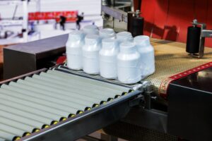 AI technology and automation systems in supplement manufacturing facility showing quality control processes
