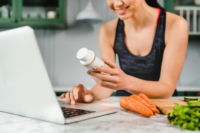 Young woman buying health supplements online