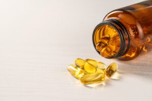 Amber colored omega 3 supplement bottle