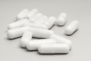 White supplements on table