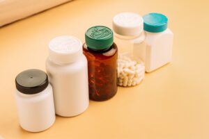 Unlabeled health supplement bottles