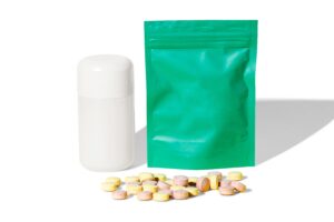 Variety of supplement packaging formats including bottles, pouches, and stick packs for private label brands
