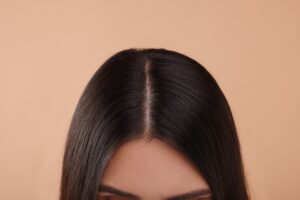 Woman with healthy shiny hair representing beauty from within supplement wellness results