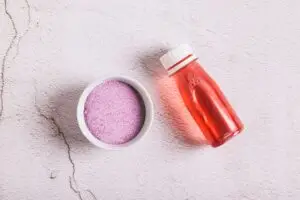 Woman tasting a supplement powder drink representing the importance of supplement flavor masking in product development